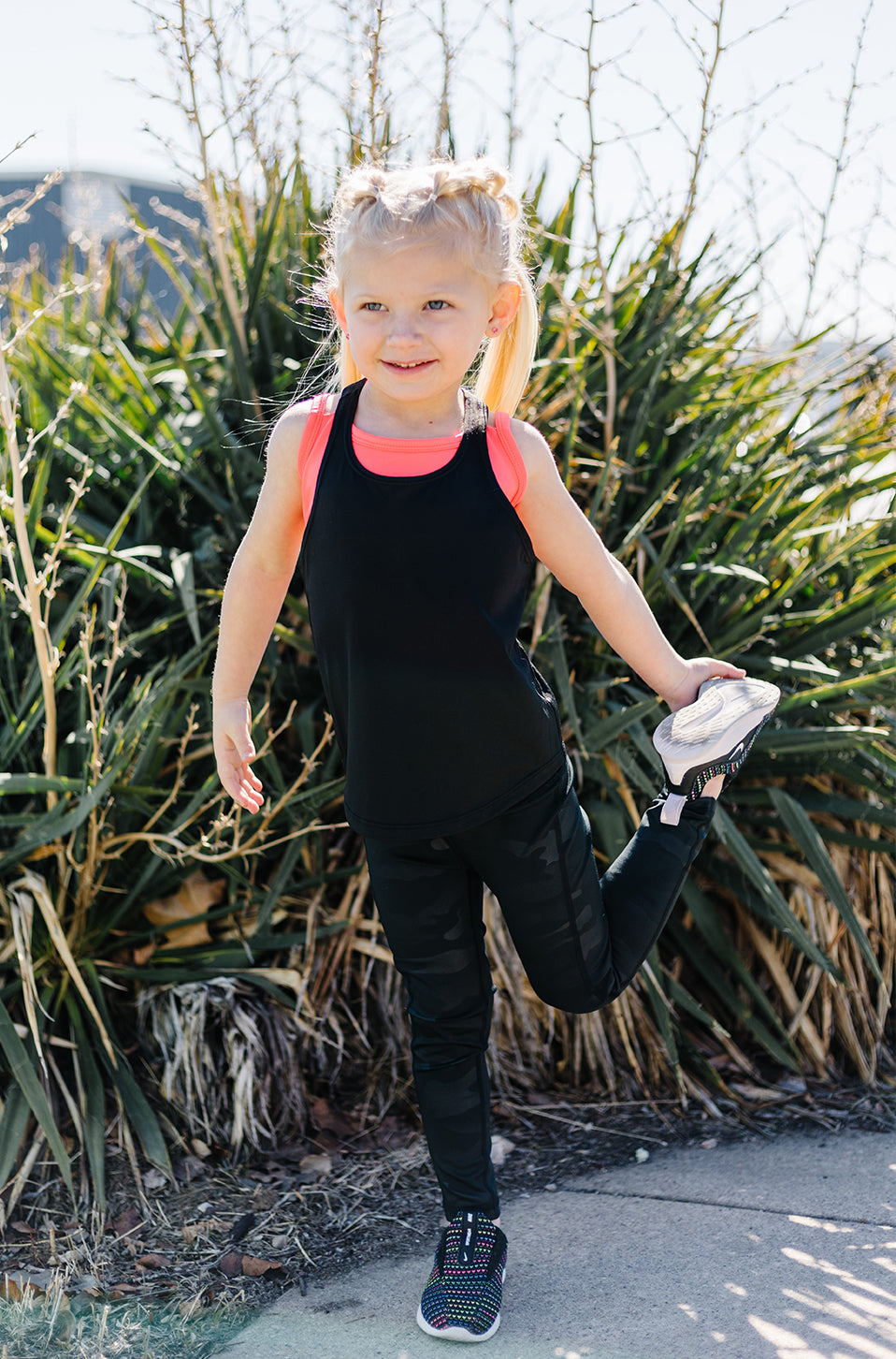 2-piece Toddler Girl Black Camisole and Camouflage Pants Set